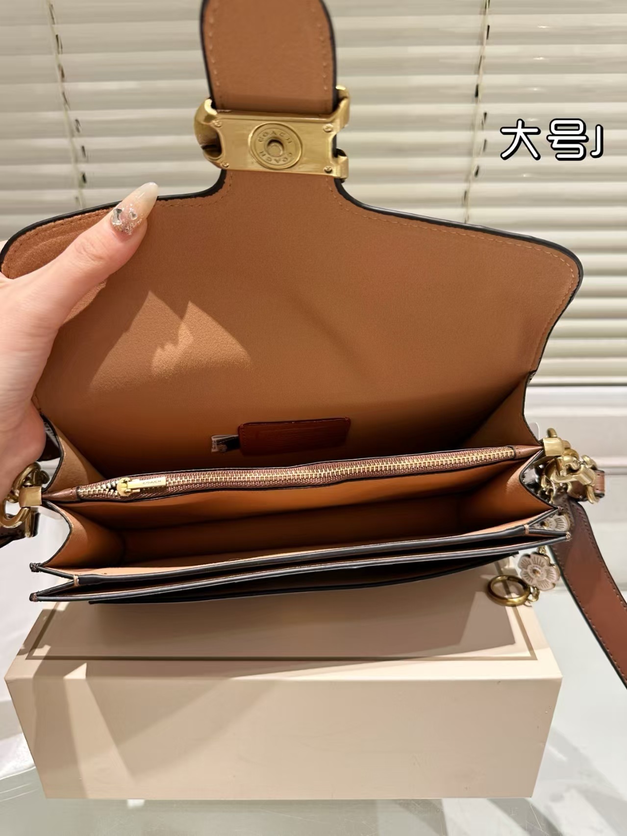 COACH $95 gallery