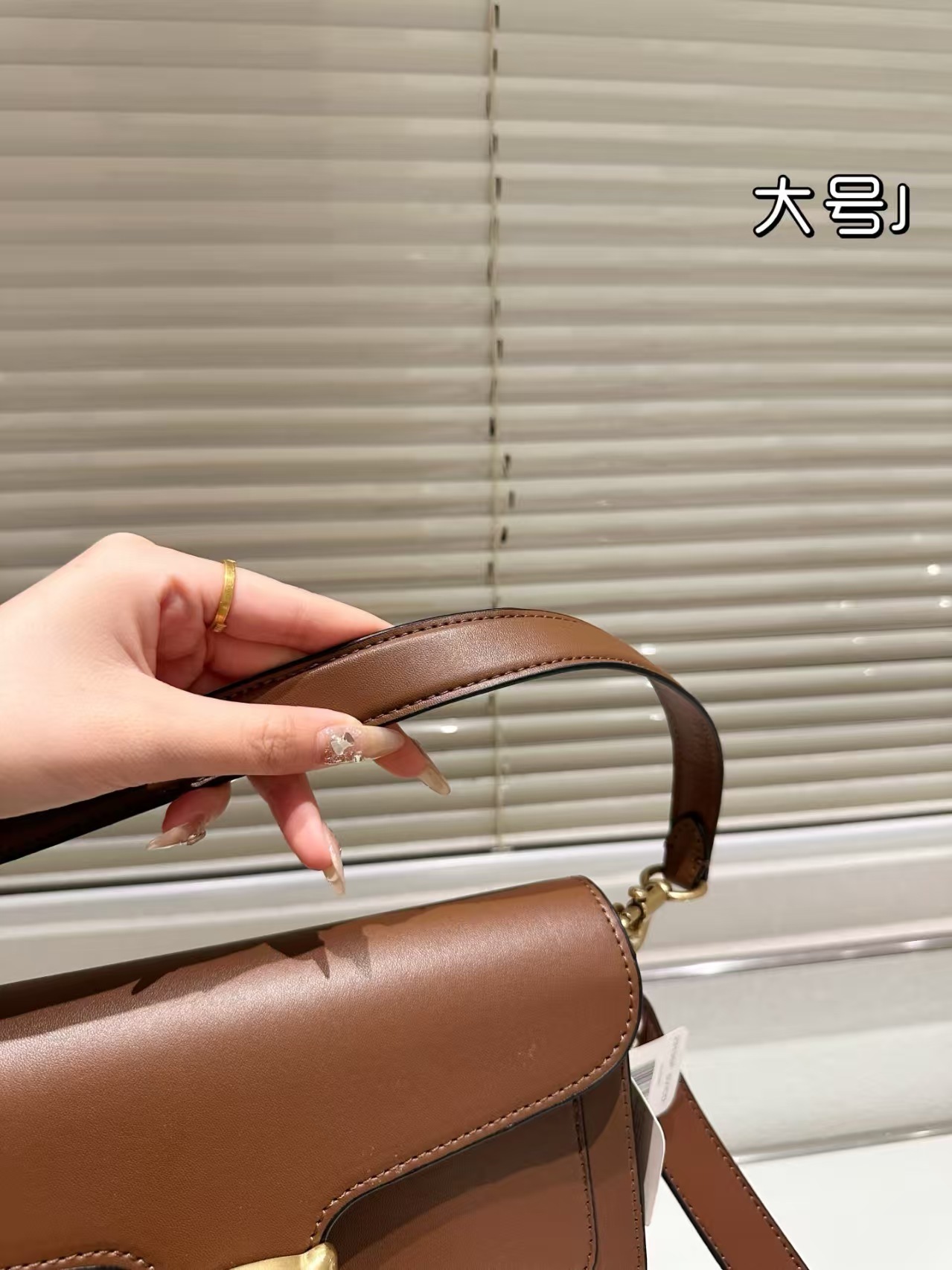 COACH $95 gallery