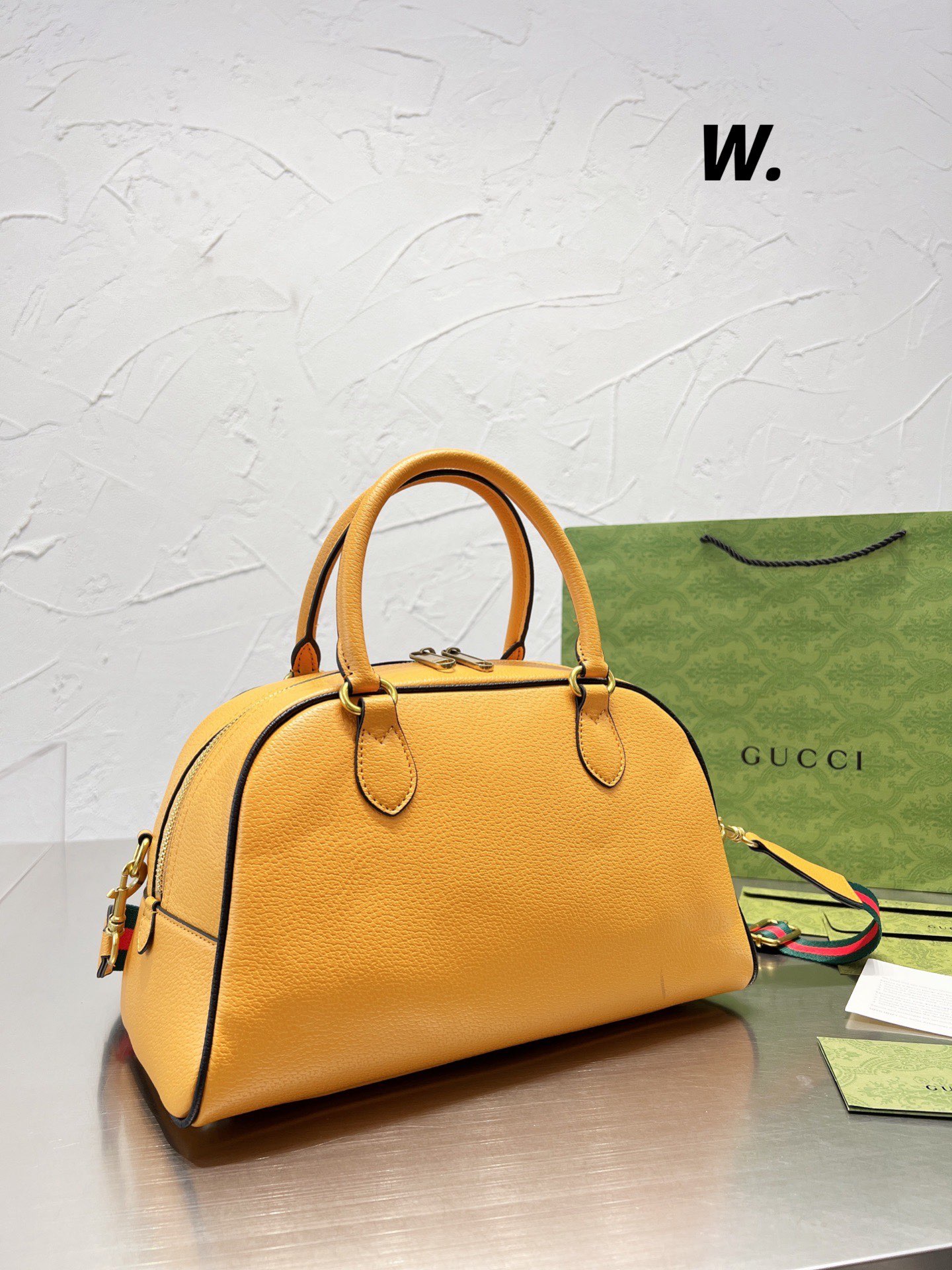 GUCCI  $65 gallery