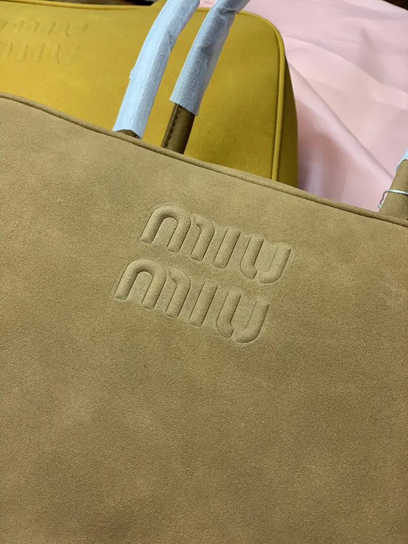 Y61M miumiu bag 53$ gallery