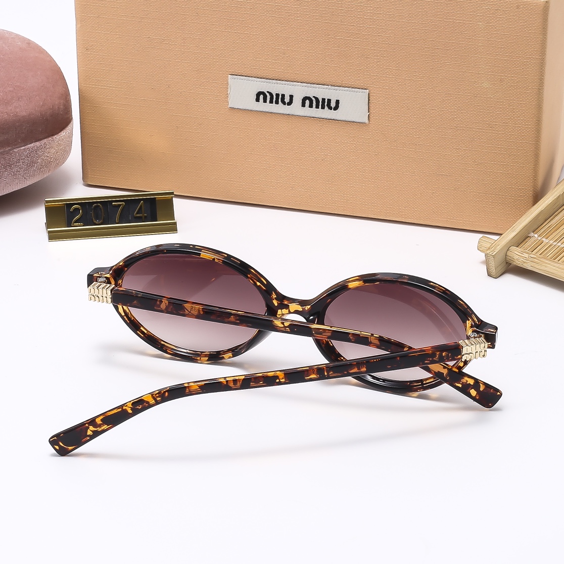 DH dh MIUMIU 2074 90654812428 FF11 gallery