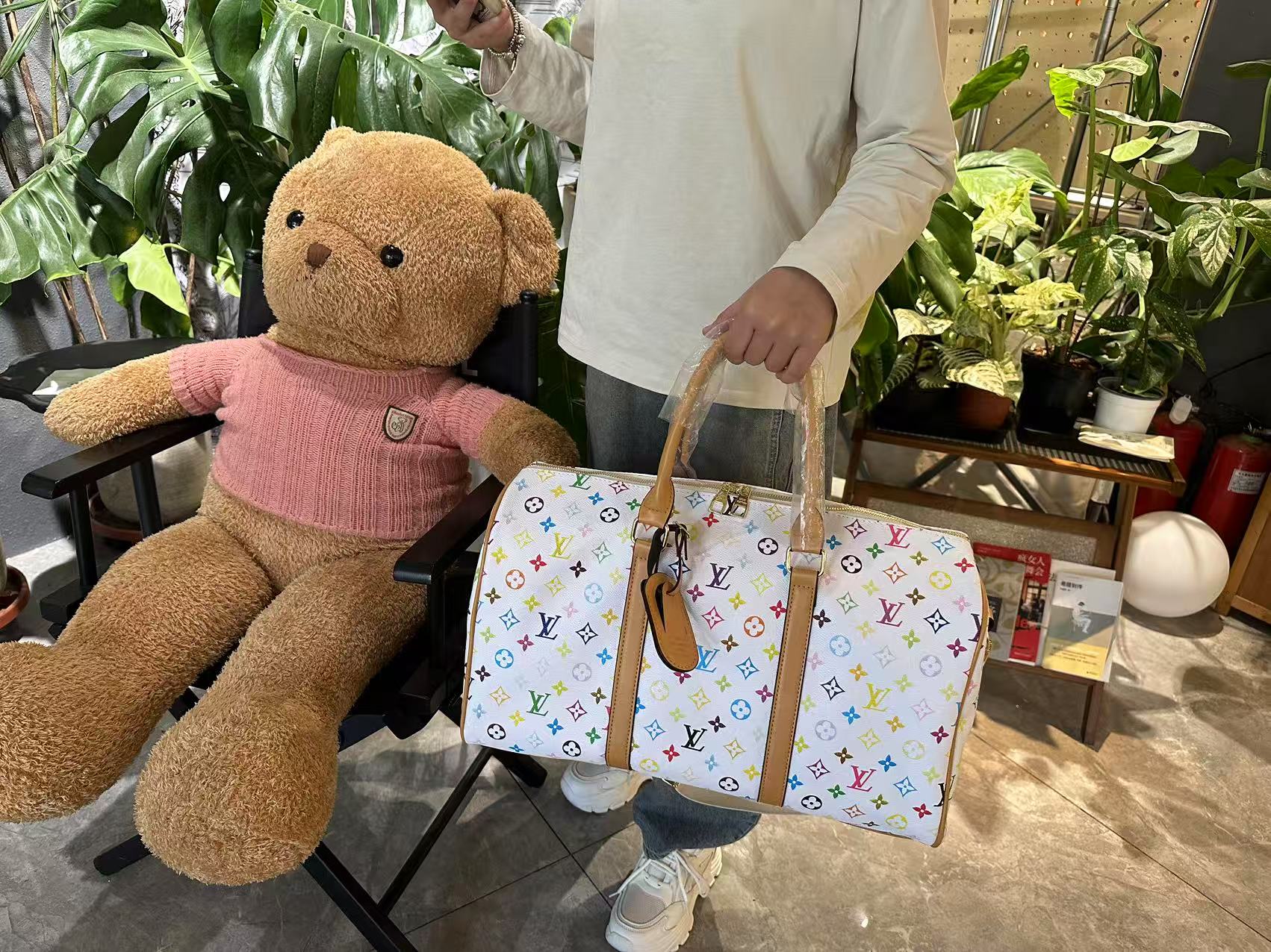 37$ dh LV 34513 Travelling bag size 45X29X18 cm 51429623578 BY2521 gallery