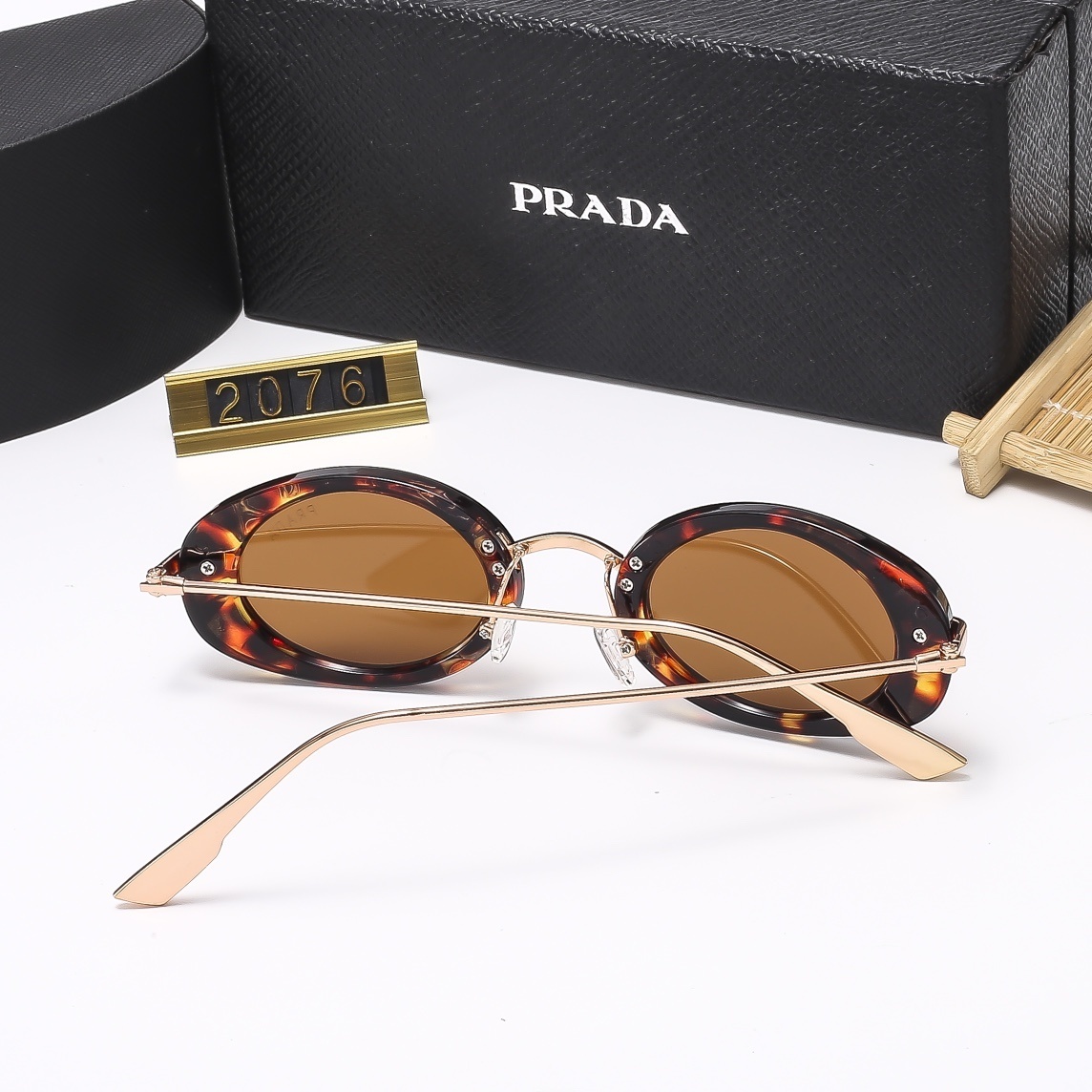 23$ new_dh PRADA 2076 40168012520 FF15 gallery