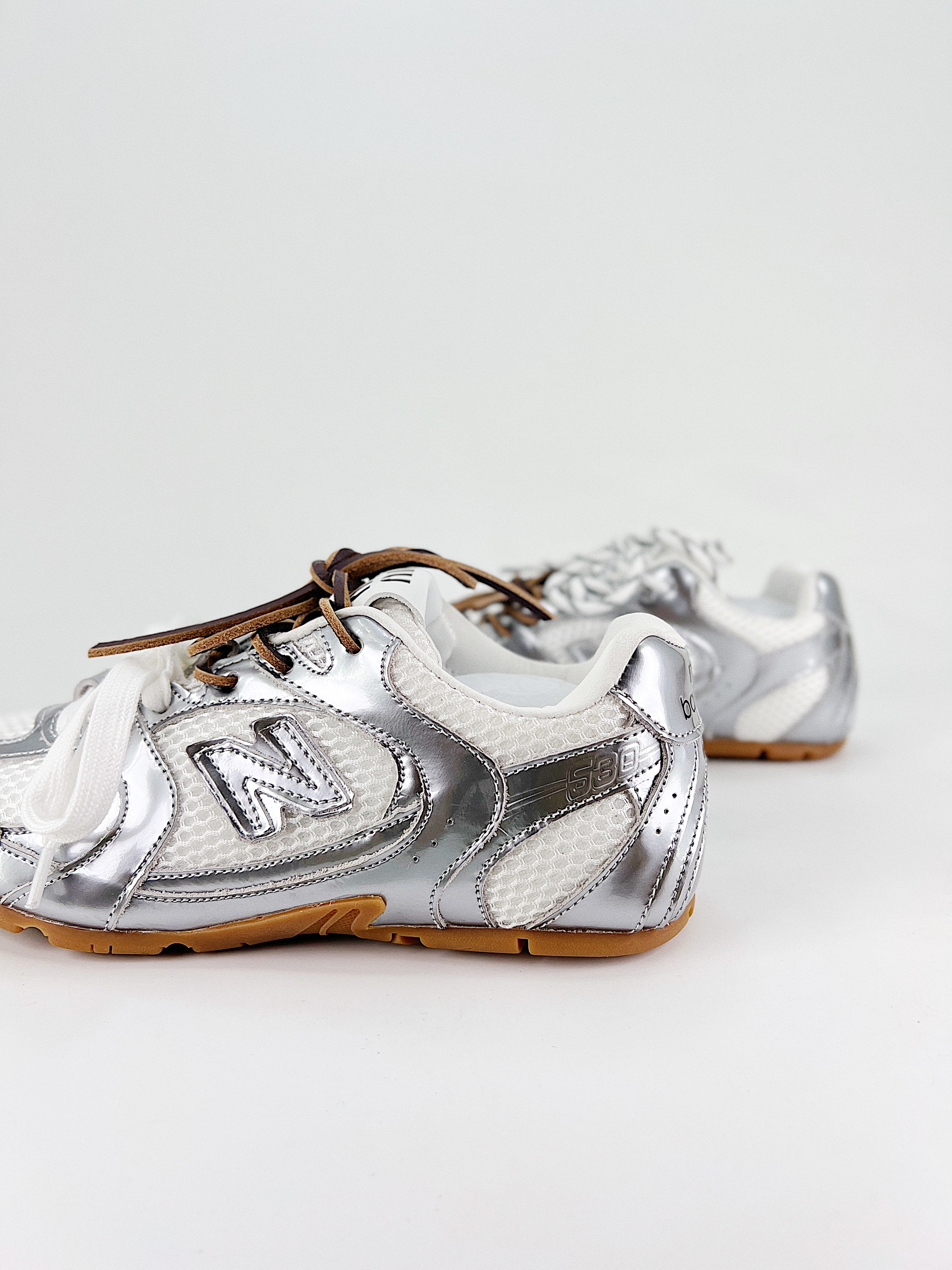 $28.99 MiuMiu x New Balance X5263 gallery