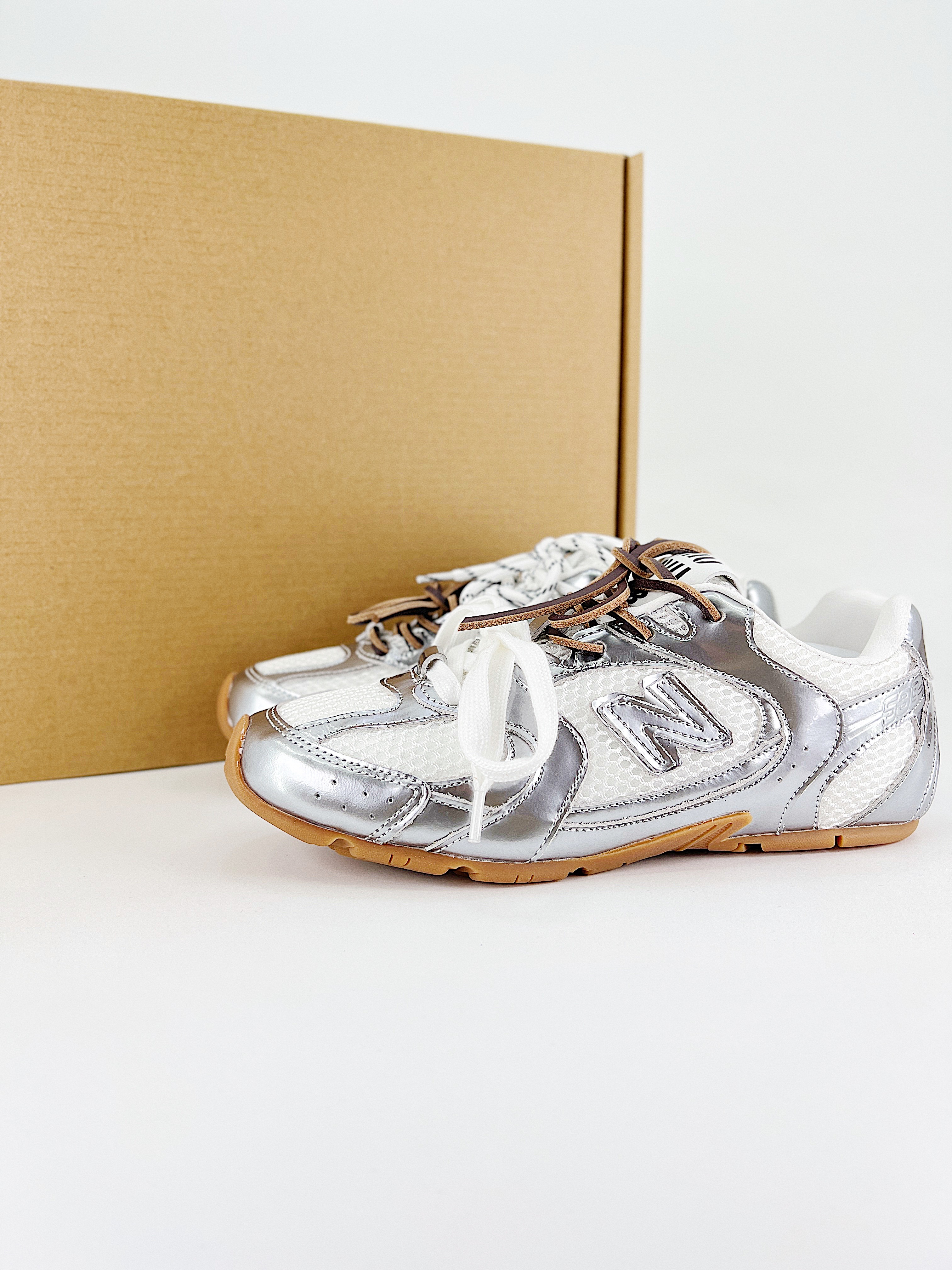 $28.99 MiuMiu x New Balance X5263 gallery