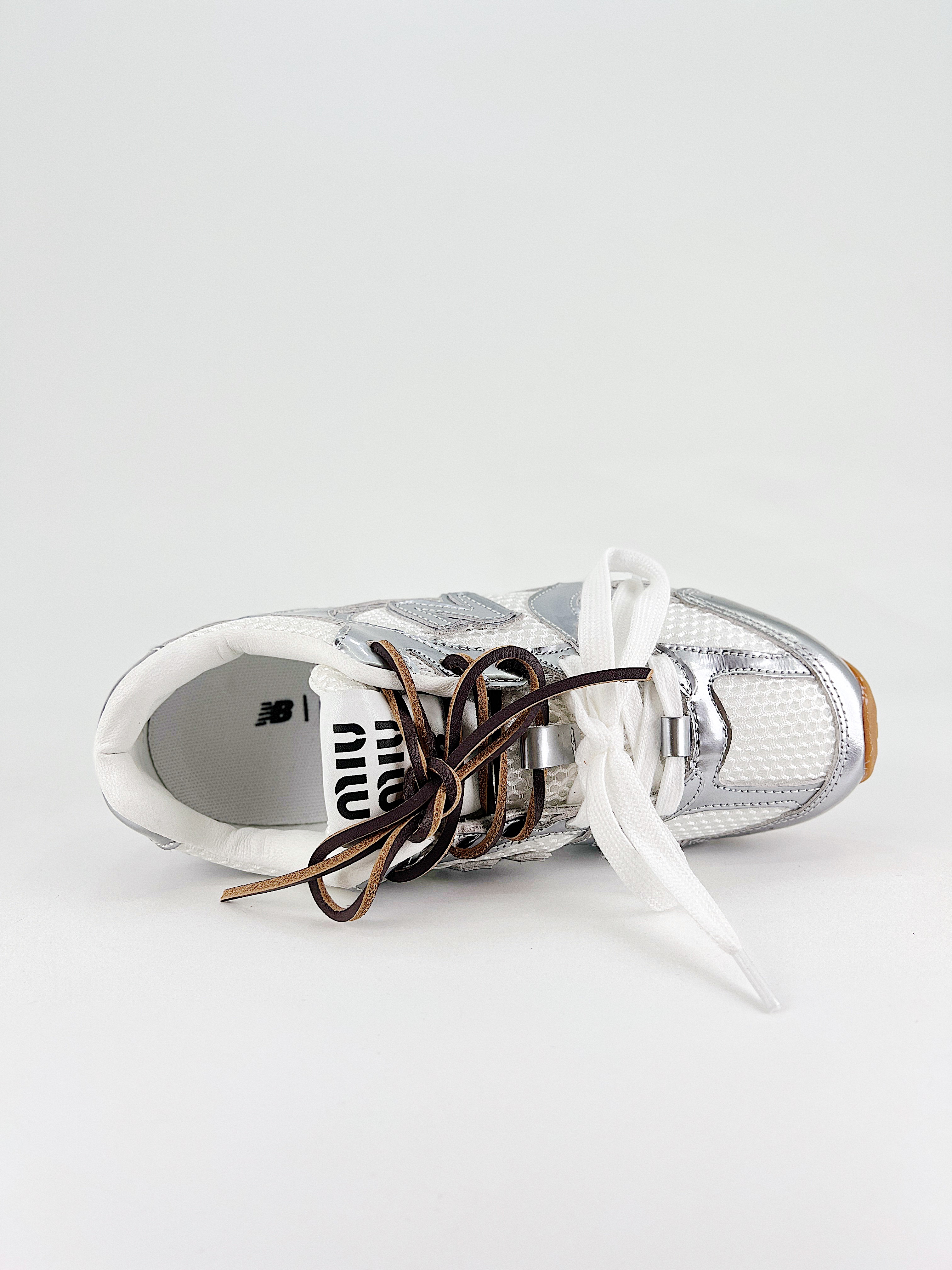 $28.99 MiuMiu x New Balance X5263 gallery