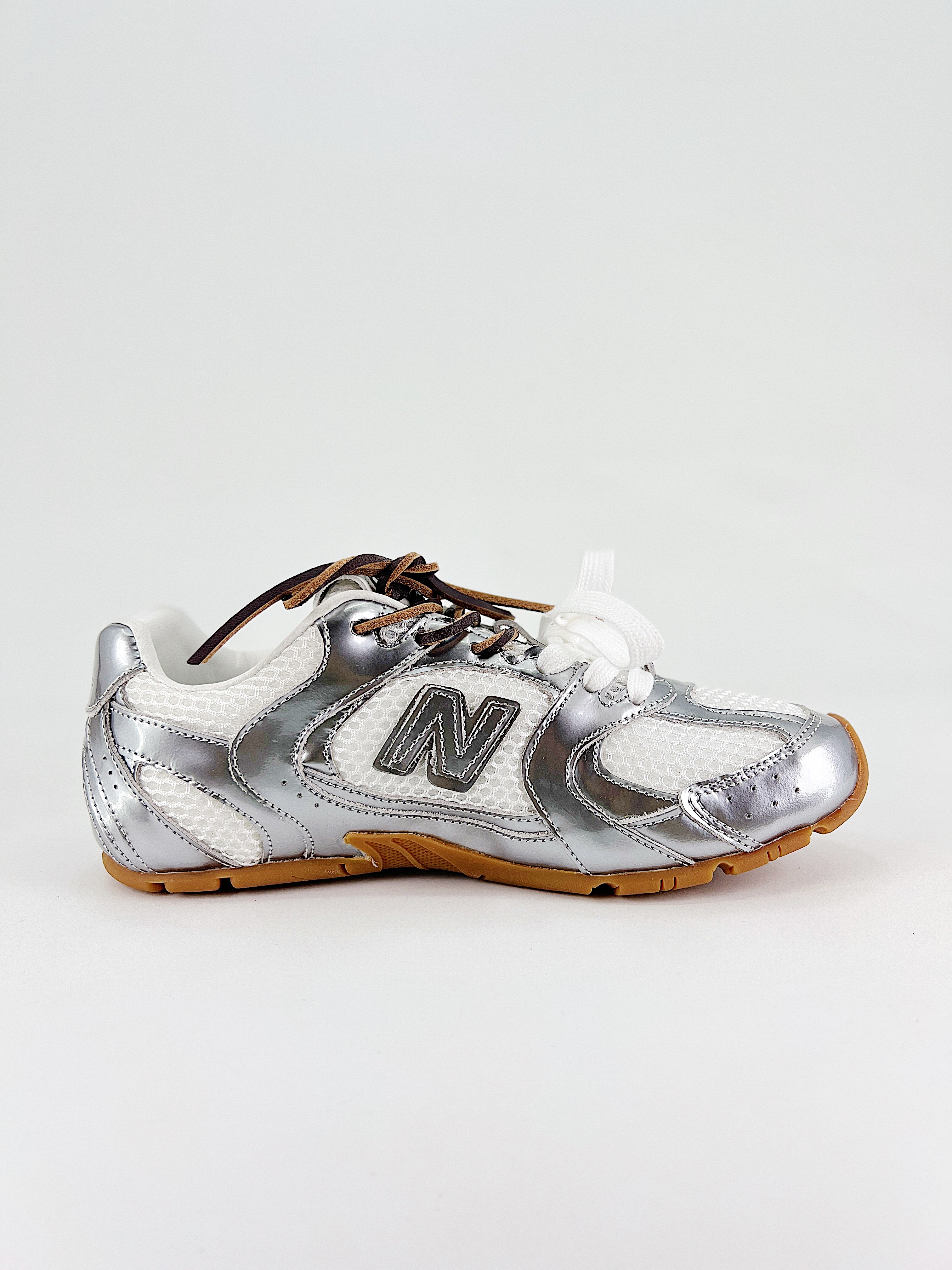 $28.99 MiuMiu x New Balance X5263 gallery