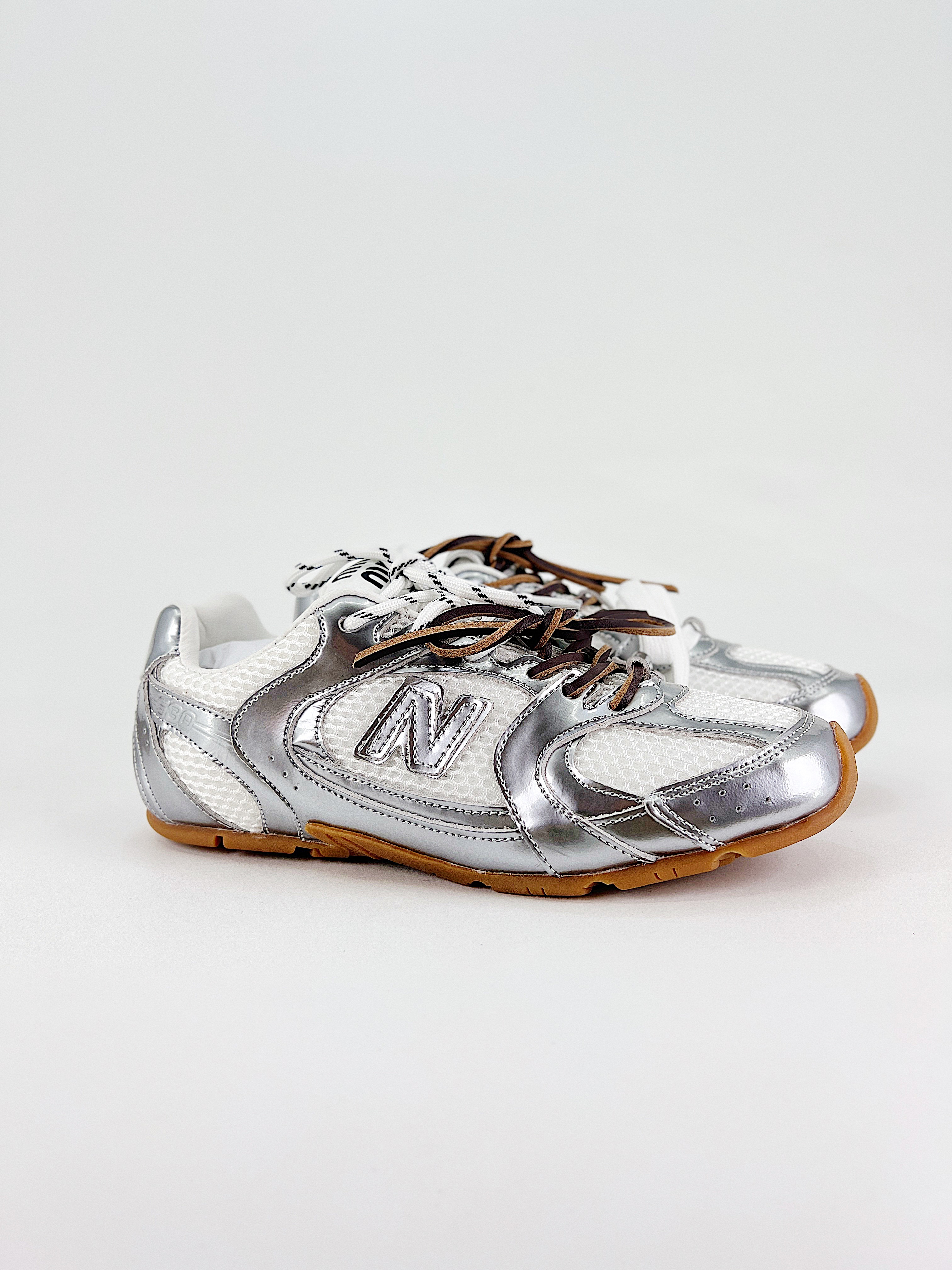 $28.99 MiuMiu x New Balance X5263 gallery