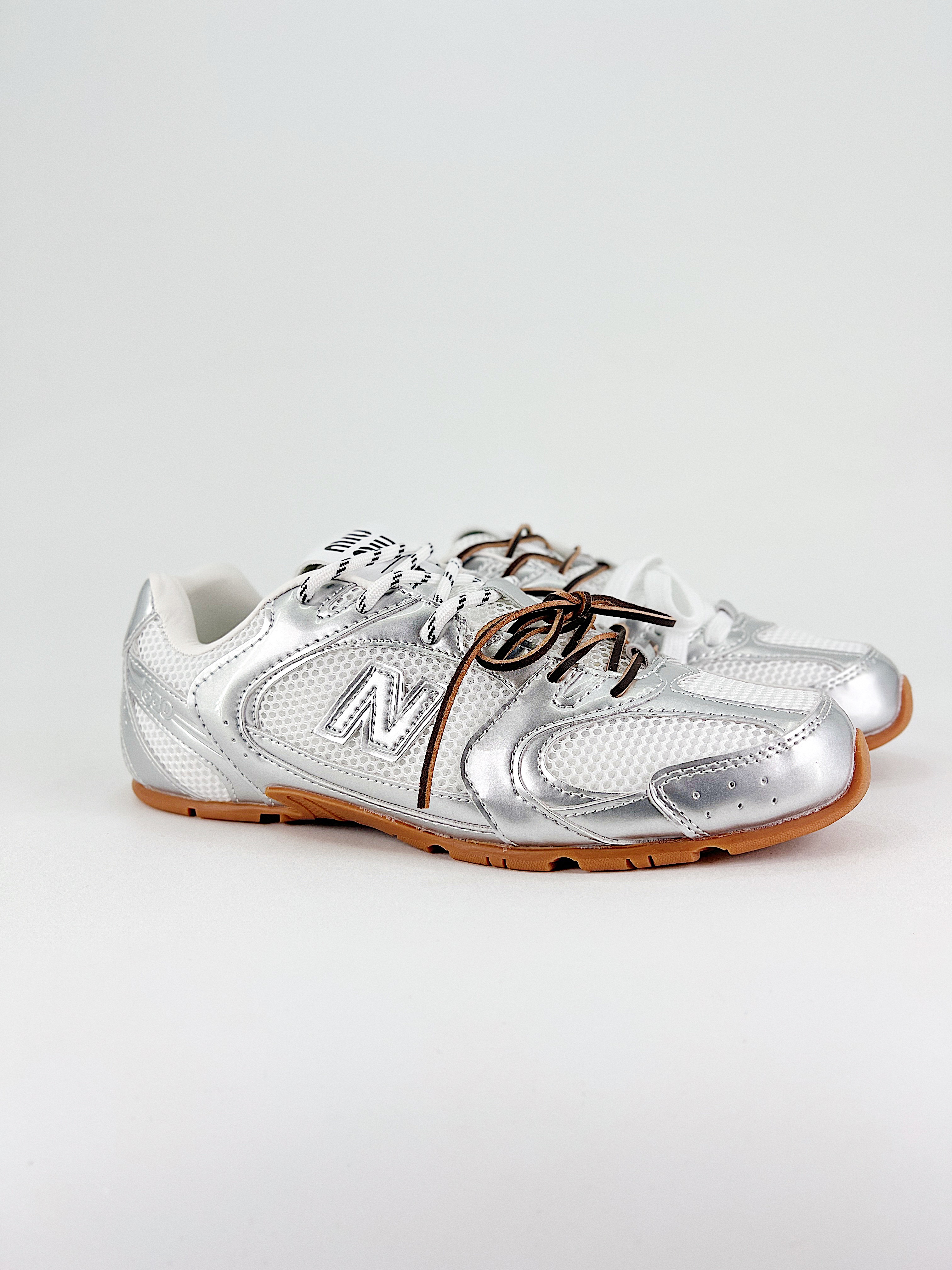$28.99 MiuMiu x New Balance X5290 gallery