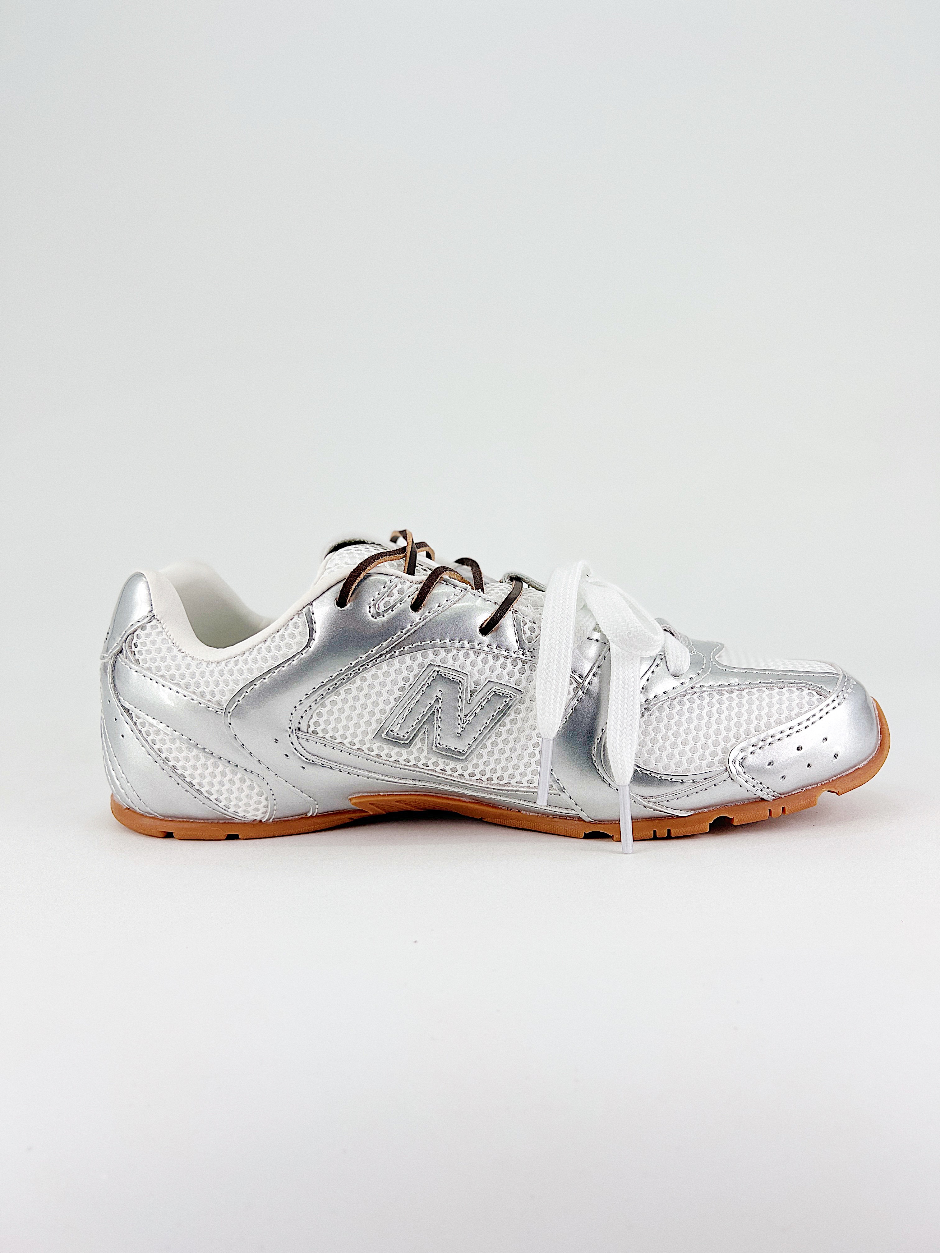 $28.99 MiuMiu x New Balance X5290 gallery