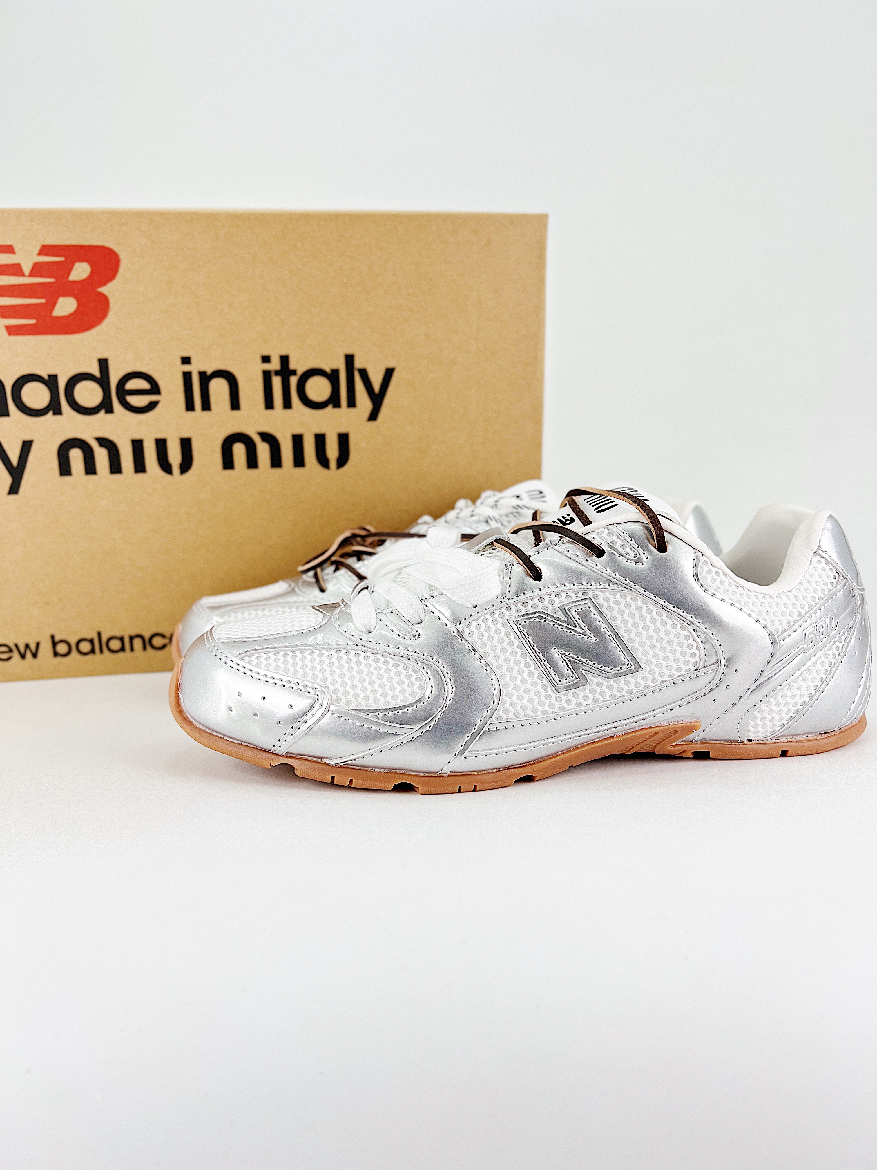 $28.99 MiuMiu x New Balance X5290 gallery