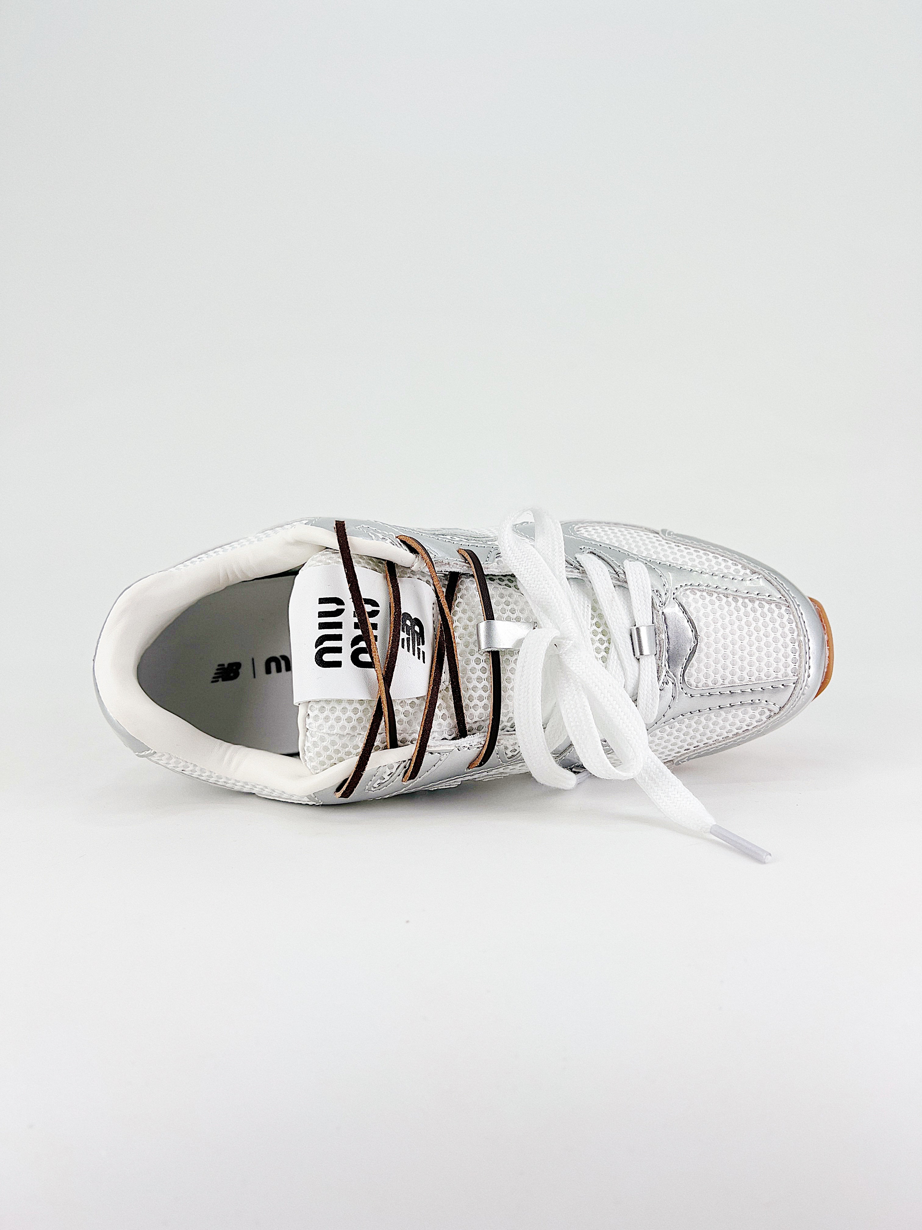 $28.99 MiuMiu x New Balance X5290 gallery