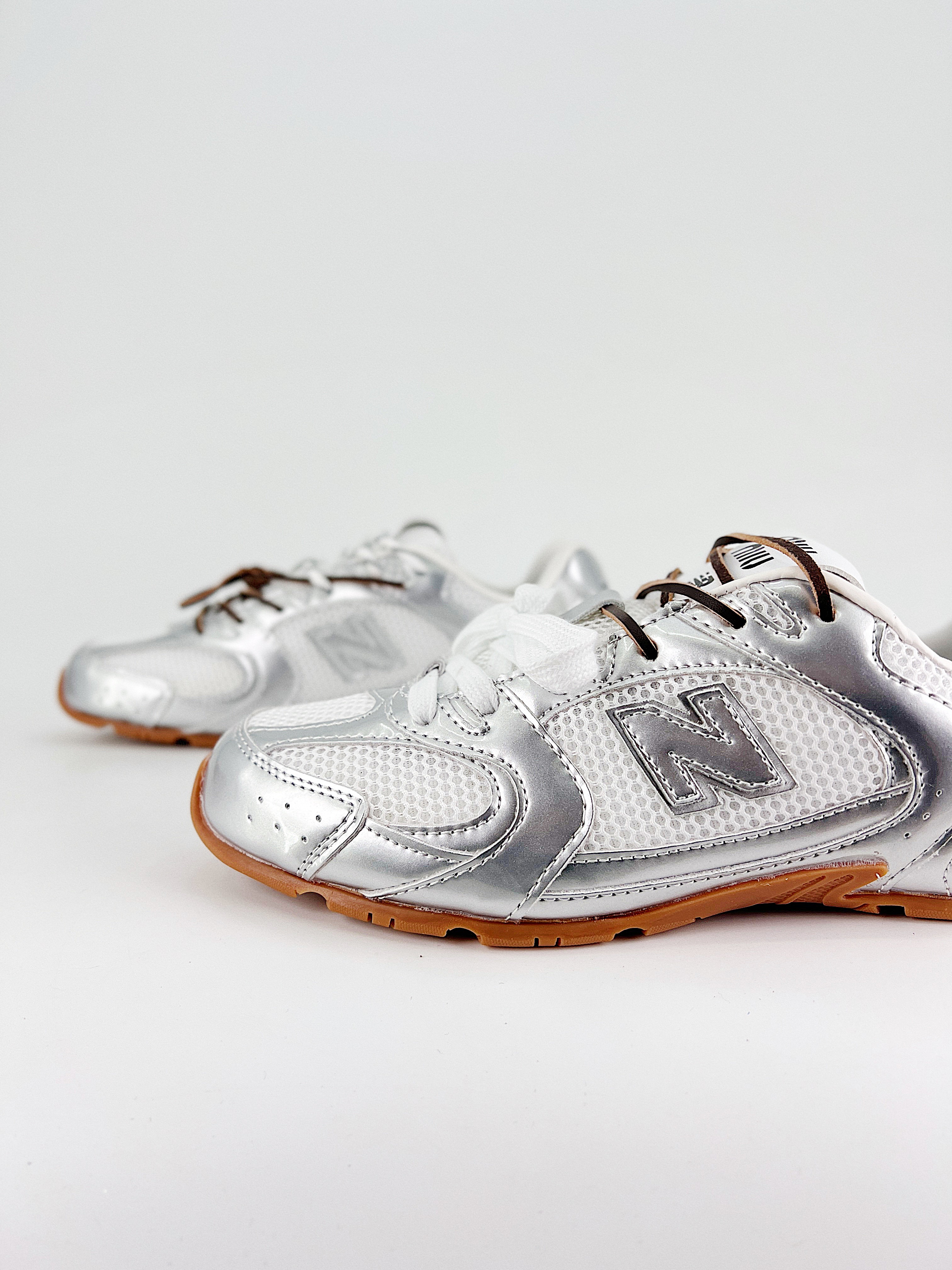 $28.99 MiuMiu x New Balance X5290 gallery