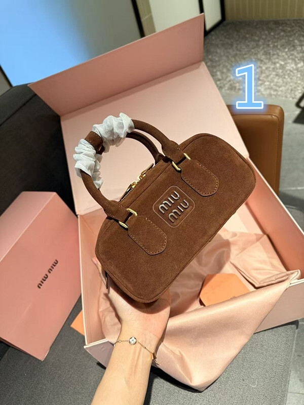 miumiu 56.54$ code 306-7808-R gallery