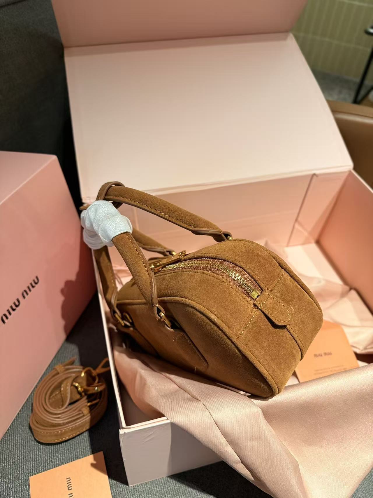 miumiu 56.54$ code 306-7808-R gallery