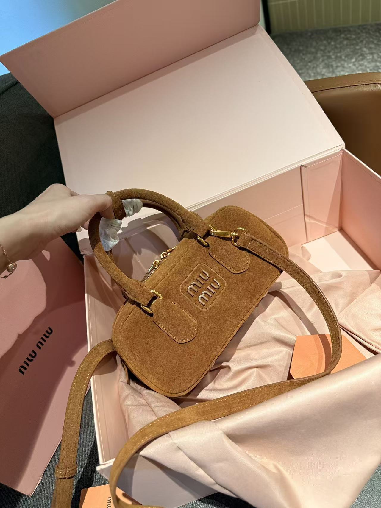 miumiu 56.54$ code 306-7808-R gallery