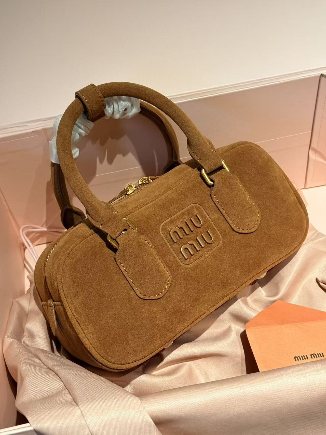 miumiu 56.54$ code 306-7808-R gallery