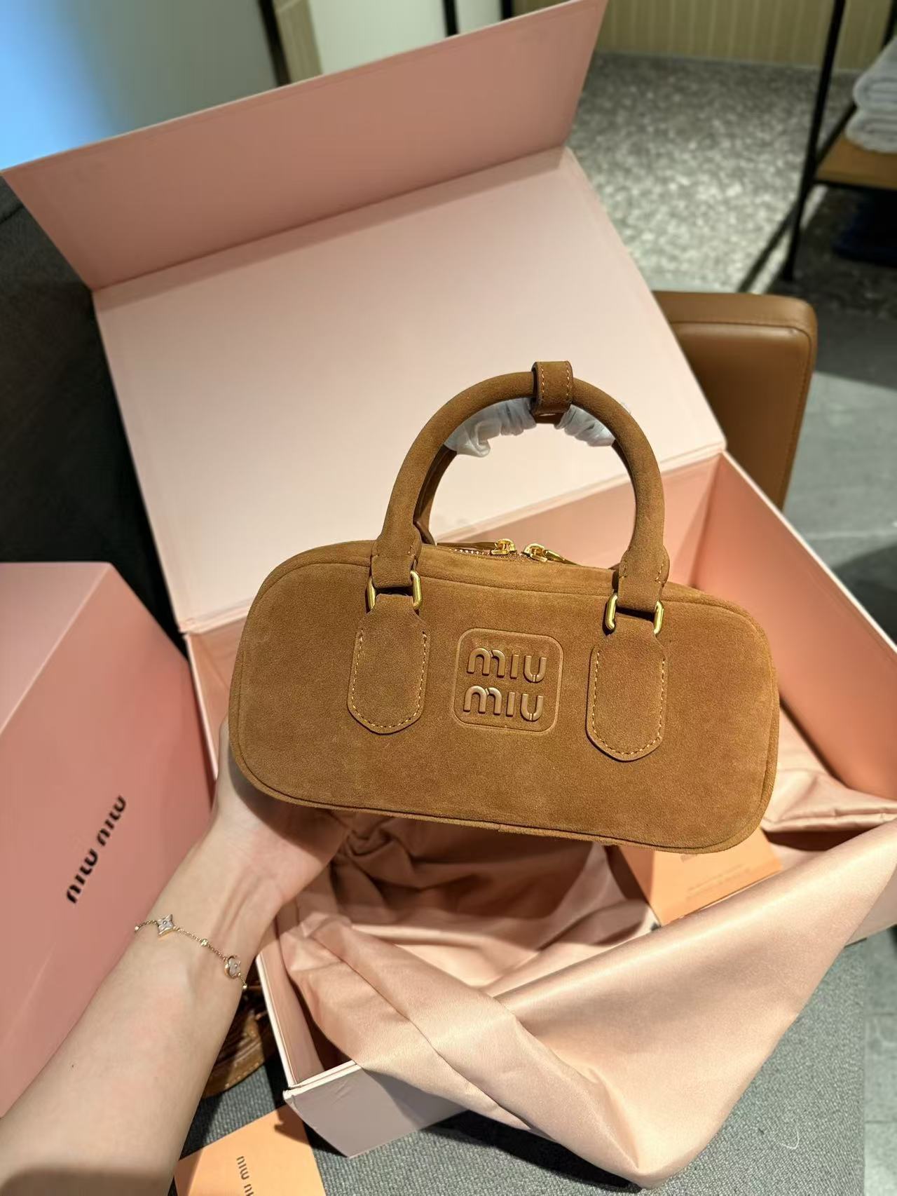 miumiu 56.54$ code 306-7808-R gallery
