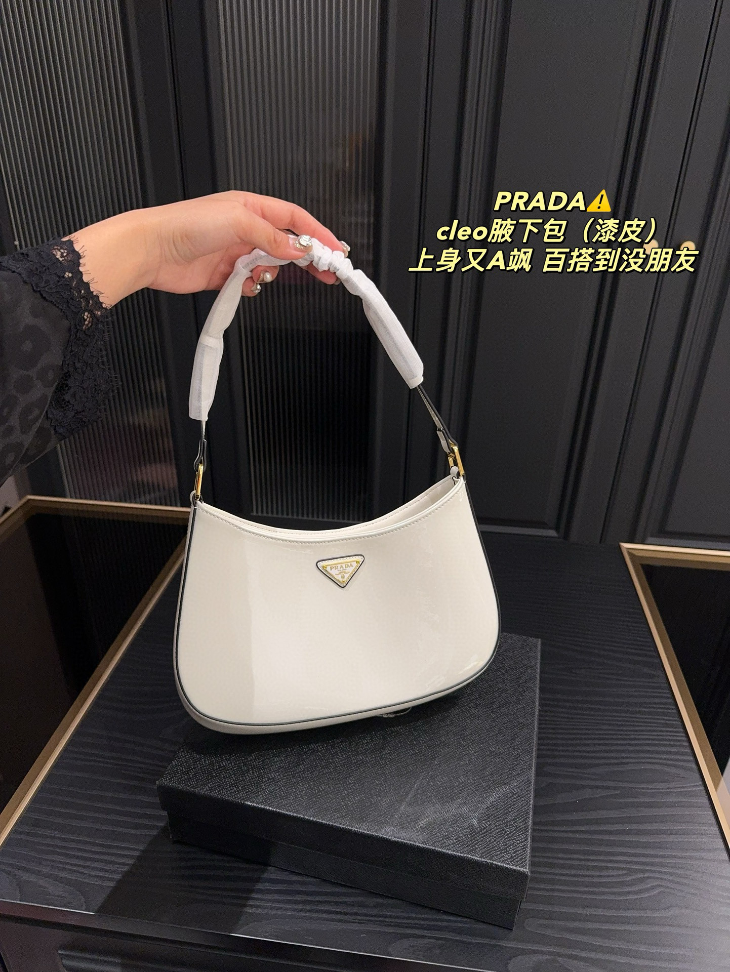 275 Prada Cleo underarm bag (patent leather)$65 gallery