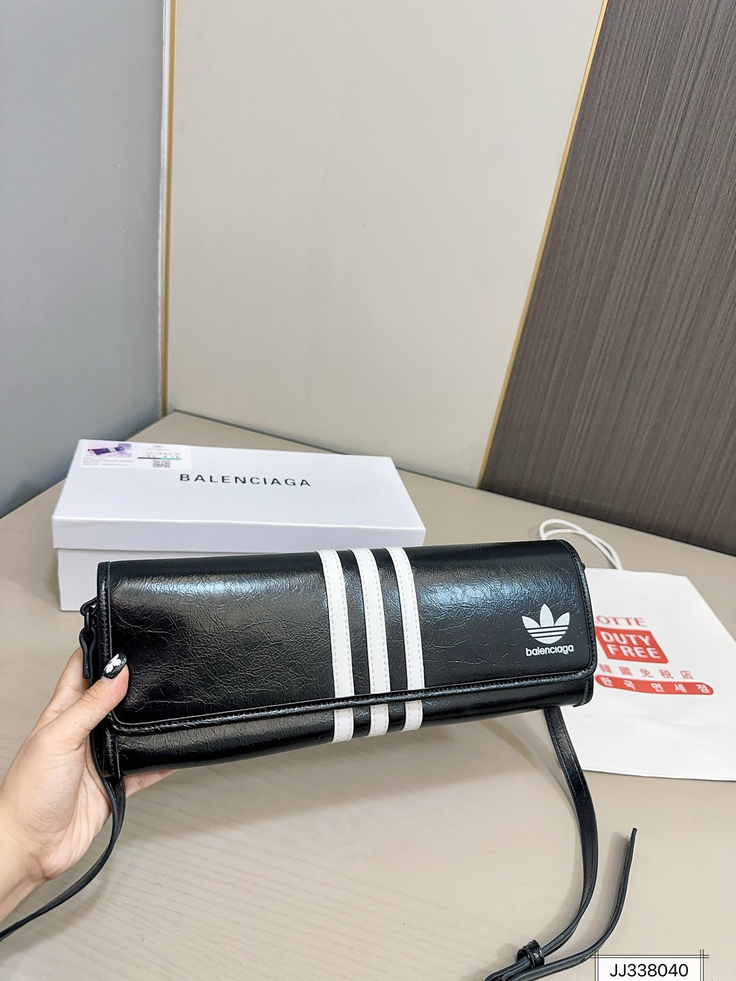 2908 $60 Balenciaga x Adidas Co branded Underarm Bag from Balenciaga gallery