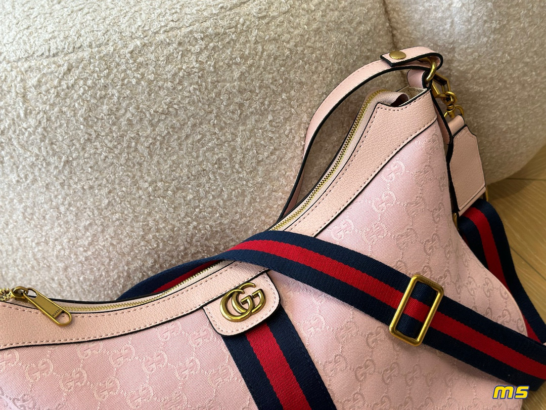 2914 $65 Gucci Half Month Bag gallery