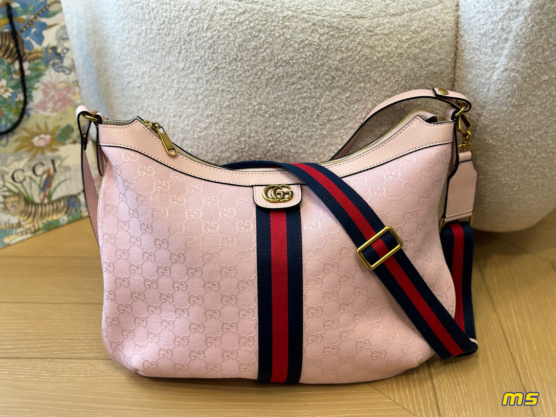 2914 $65 Gucci Half Month Bag gallery
