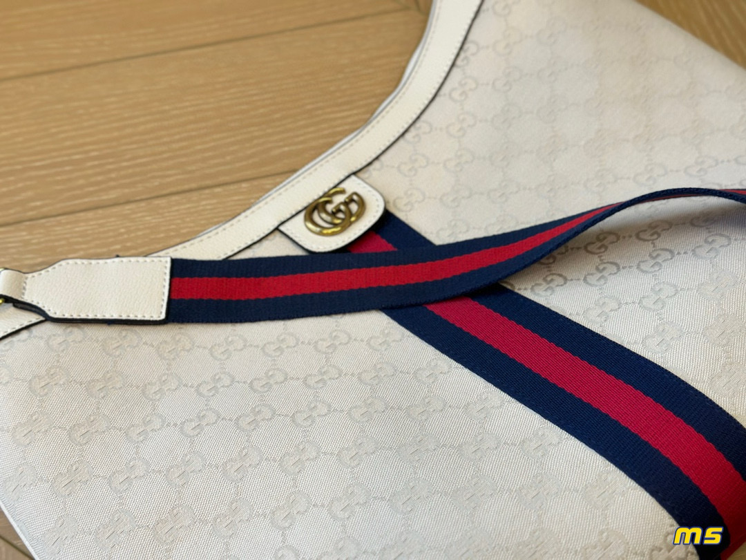 2914 $65 Gucci Half Month Bag gallery