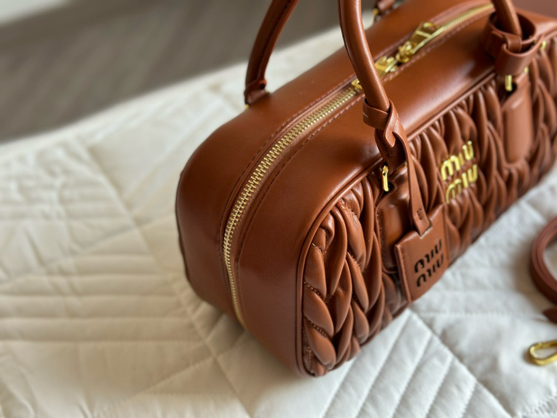 89890  miumiu  $75 gallery