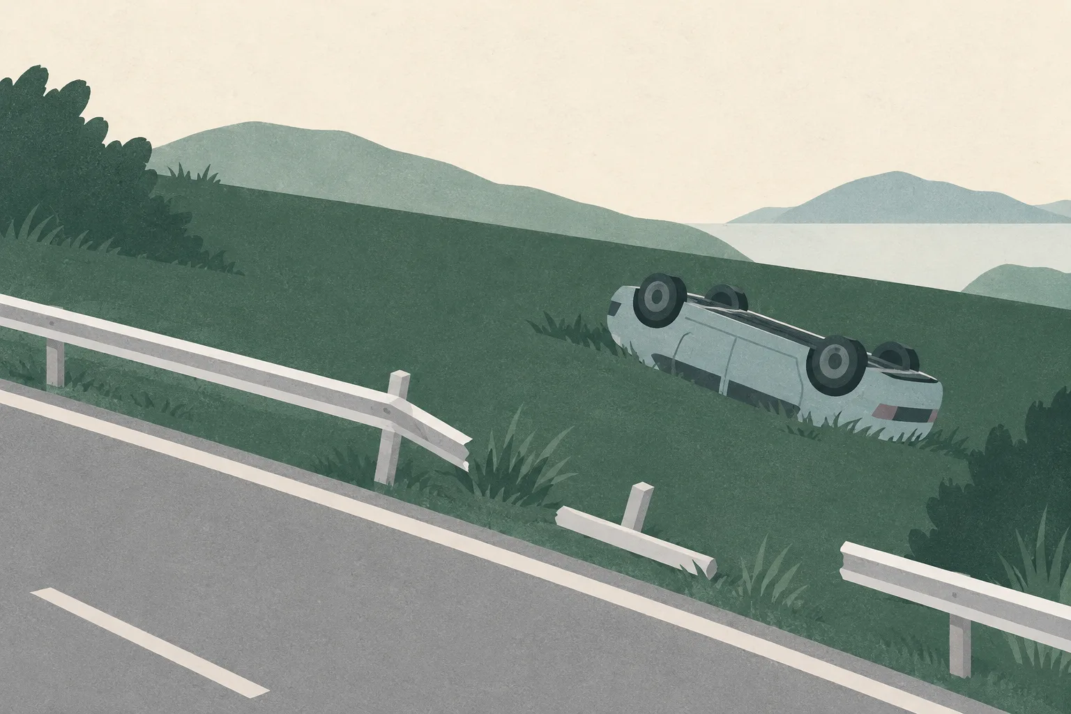 A small overturned car rests on a muted grass slope beside a simple road edge and a short broken stretch of railing.