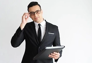 A man holding goggles with black suite A man holding goggles with black suite
