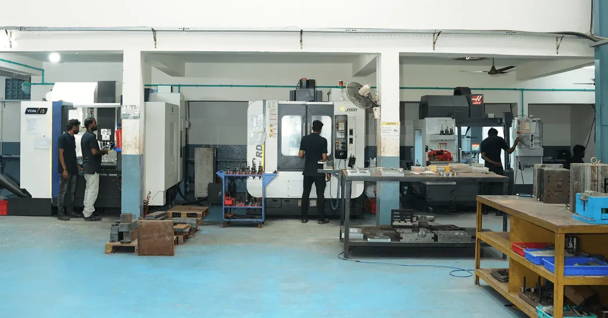 The tool room at Radiant Design, Ambattur, Chennai: machining centres with operators at work