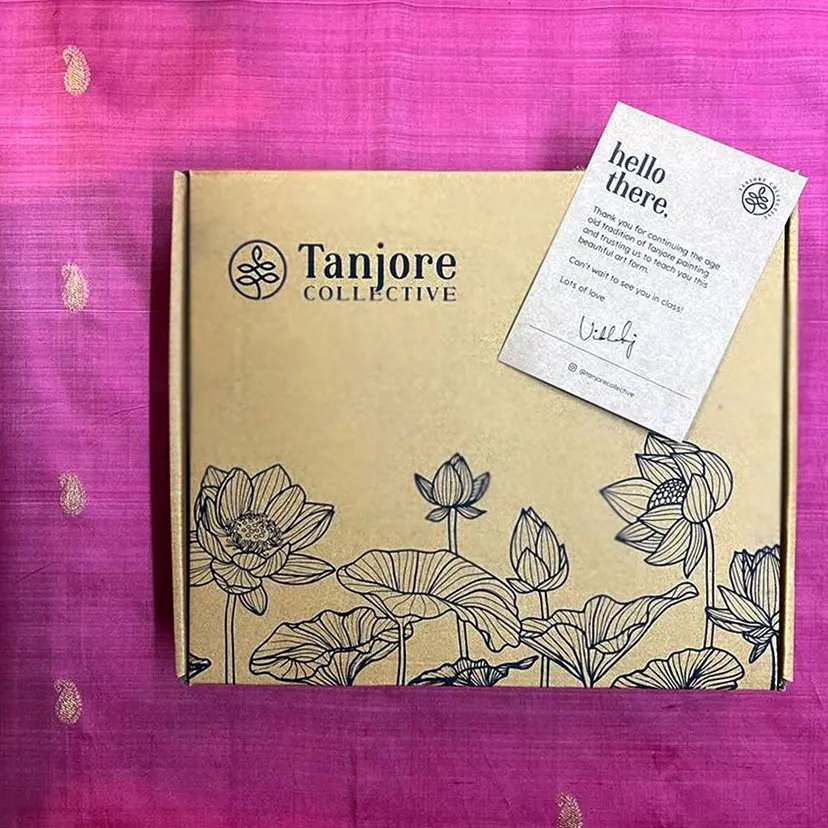 A Tanjore Collective material kit box with a welcome card, ready to ship