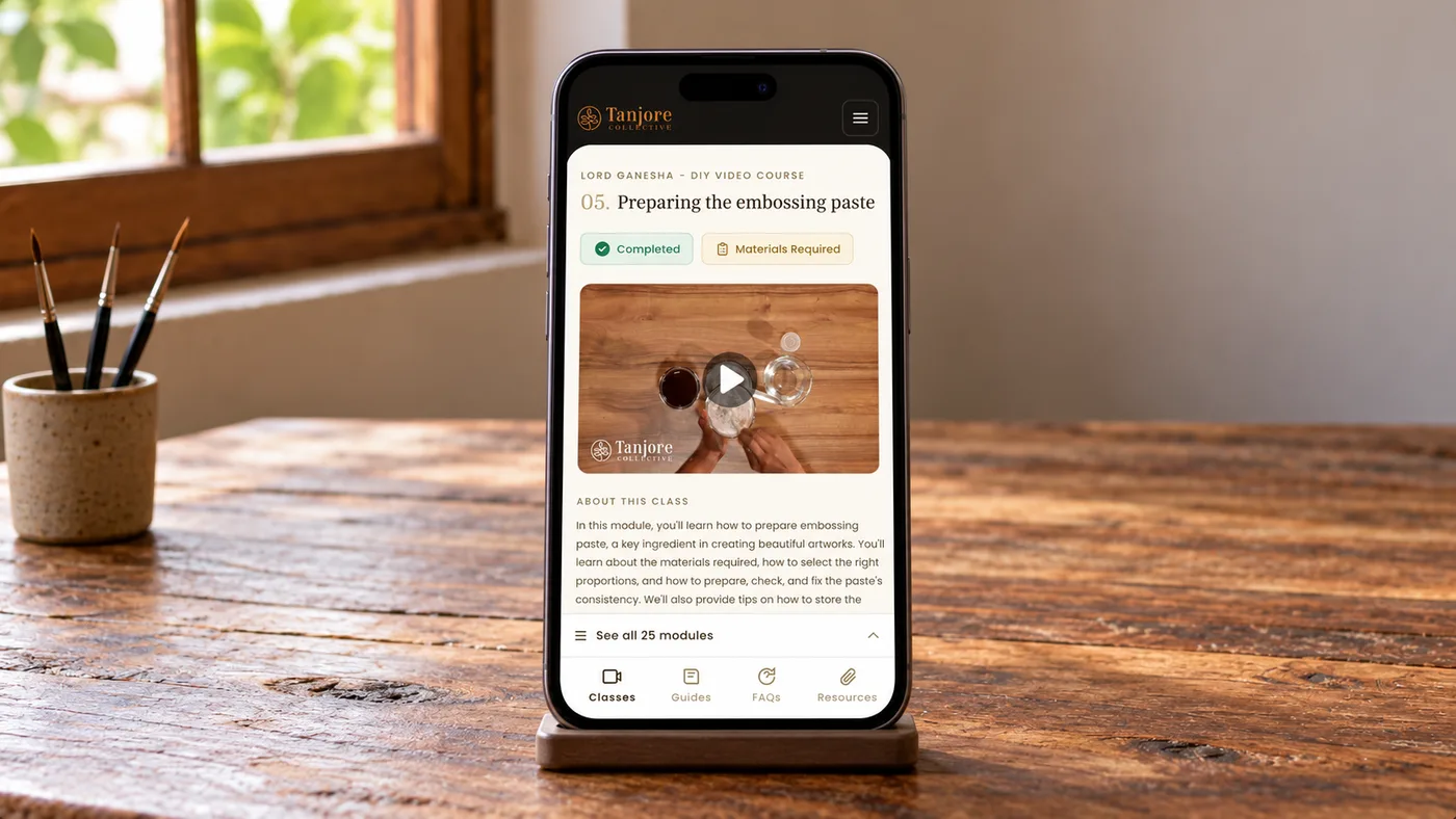 The Tanjore Collective student app on a phone, showing a course lesson with its video