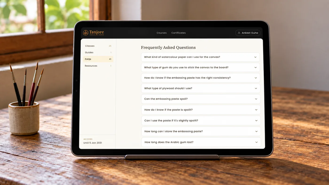 The Tanjore Collective student portal FAQ section on a tablet