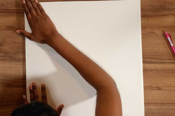 Preparing the board for a Tanjore painting on a wooden table