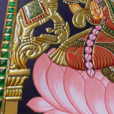 A Gaja Lakshmi Tanjore painting with gold foil and inlaid stones
