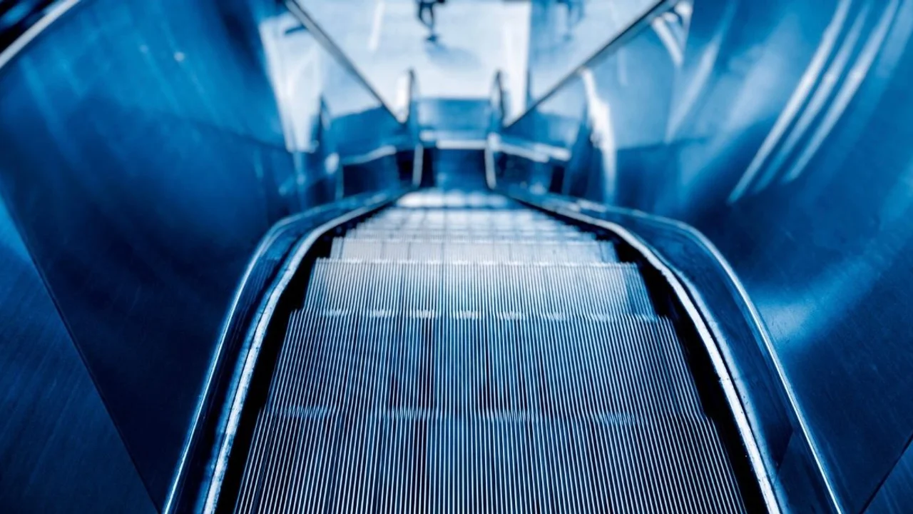 Escalator maintenance company slapped with S$15K fine after elderly man & woman fell in Hougang 
