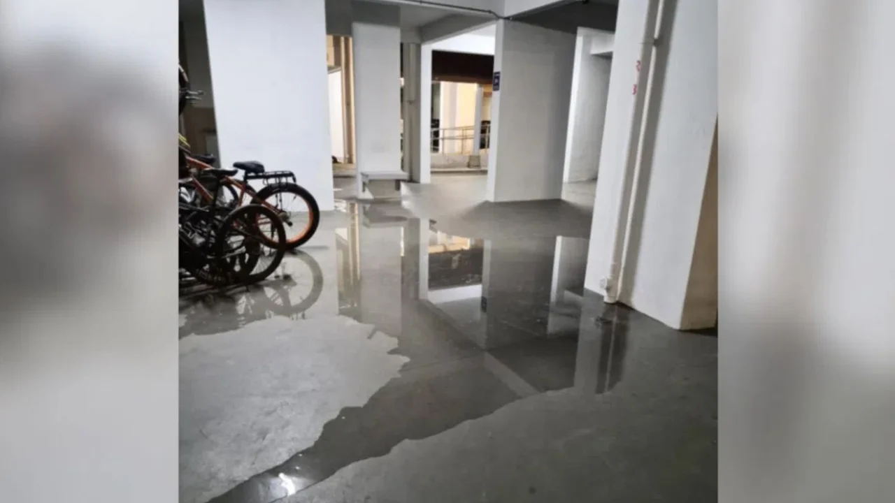 'Mysterious flooding': Residents urge action over recurring puddles below Hougang HDB block following slip-and-fall accidents
