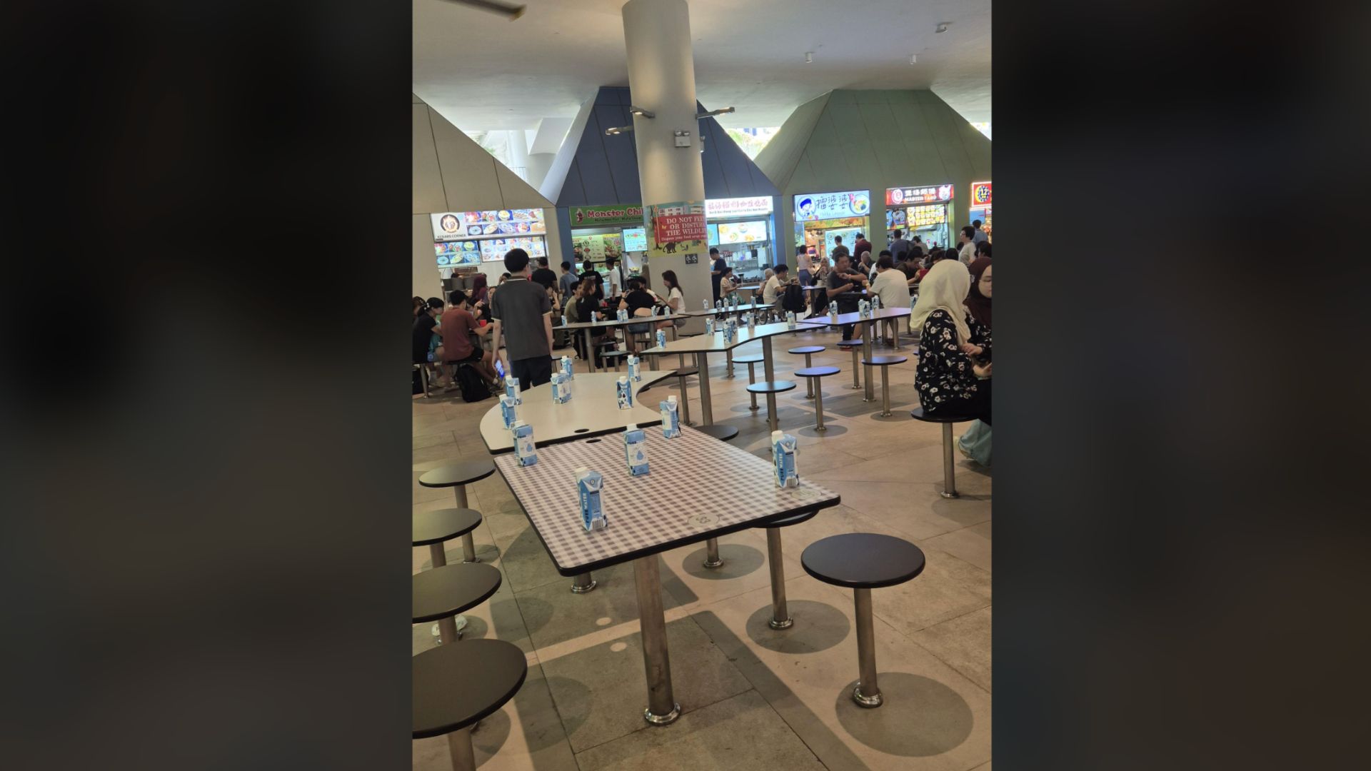 Too much for Singapore’s ‘chope’ culture? 35 water bottles reserve 16 hawker seats in Singapore, owner vanishes