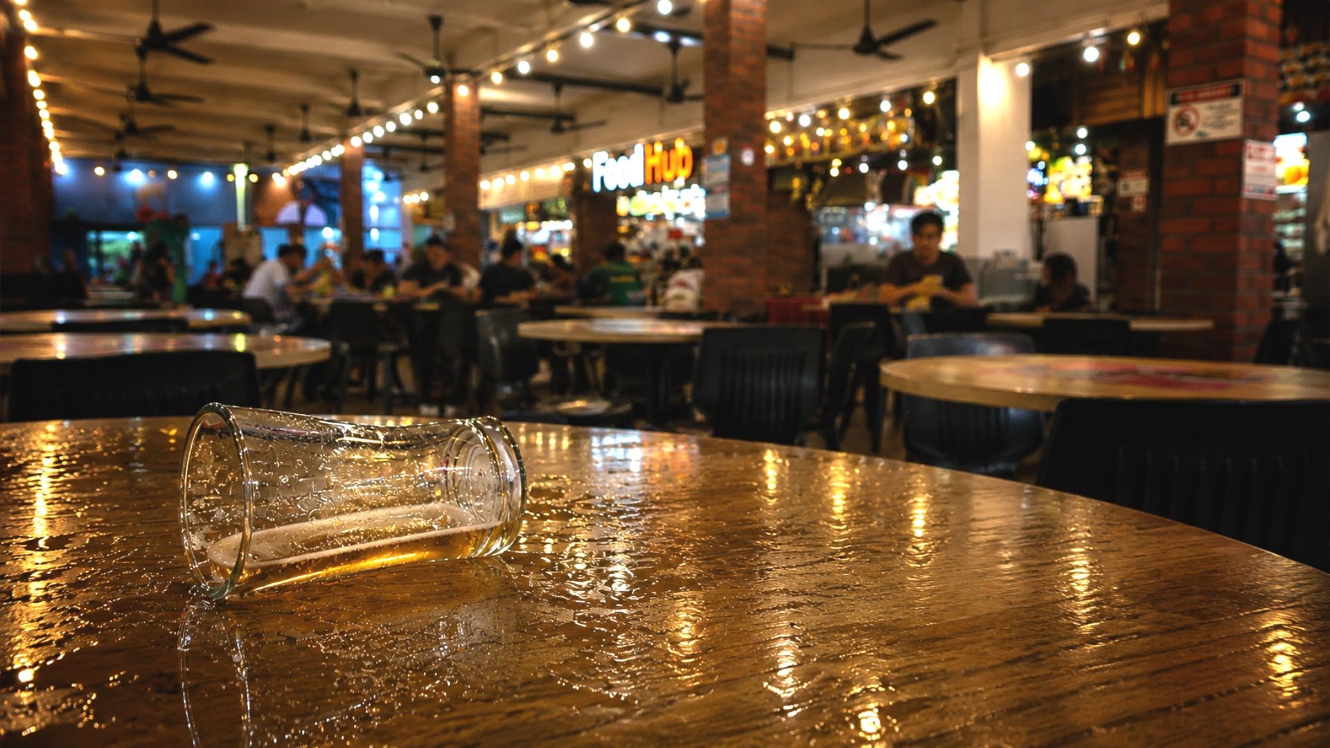 Man, 56, charged with criminal intimidation after allegedly throwing glass and chair at girl, 14, for refusing to drink beer with him at Singapore coffeeshop