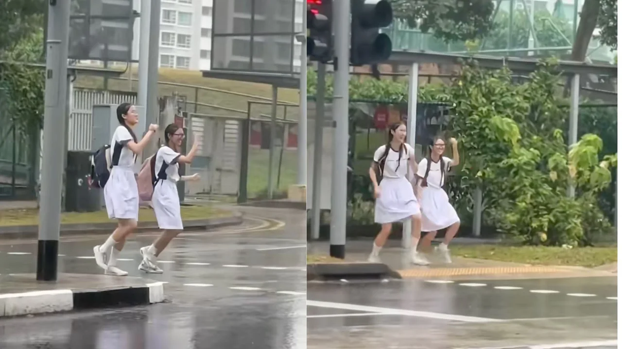 Two students dancing in the rain while crossing street sparked online discussion, giving nostalgia among netizens