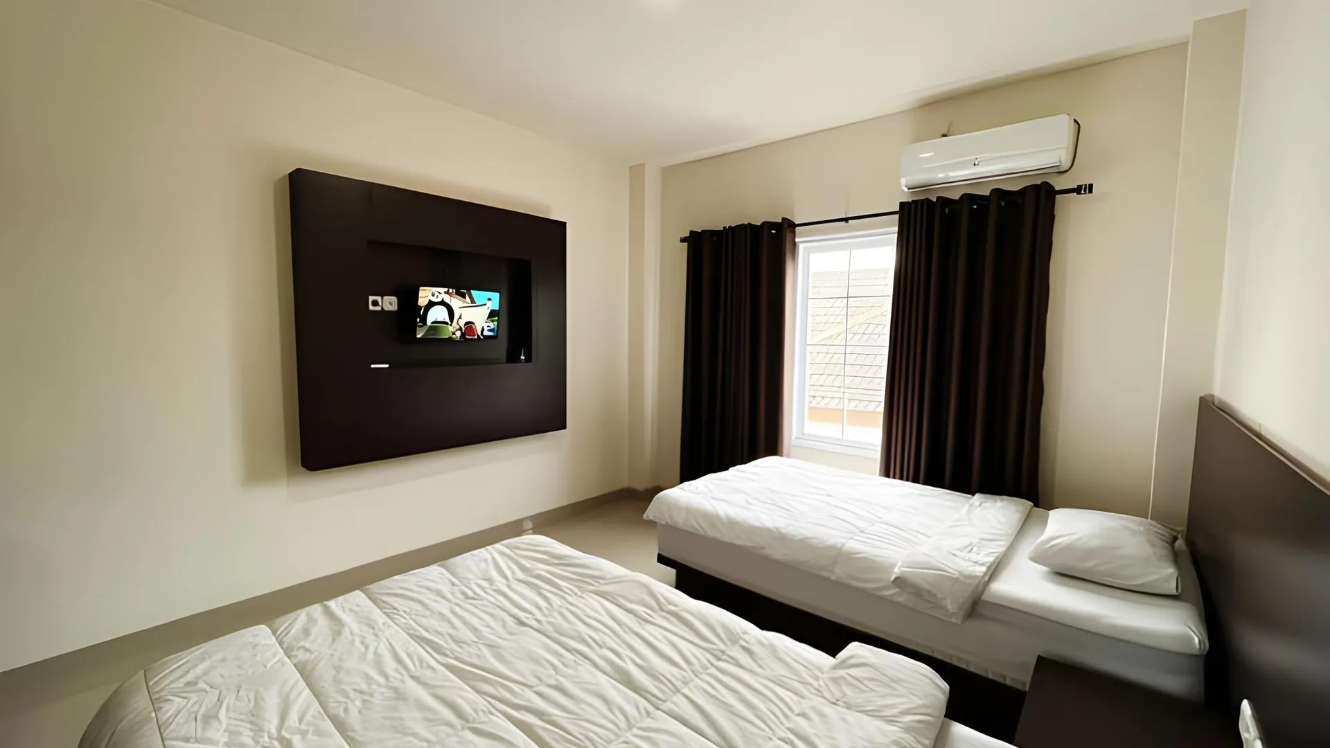 마카사르 De capitol Hotel Syariah 호텔 스위트룸