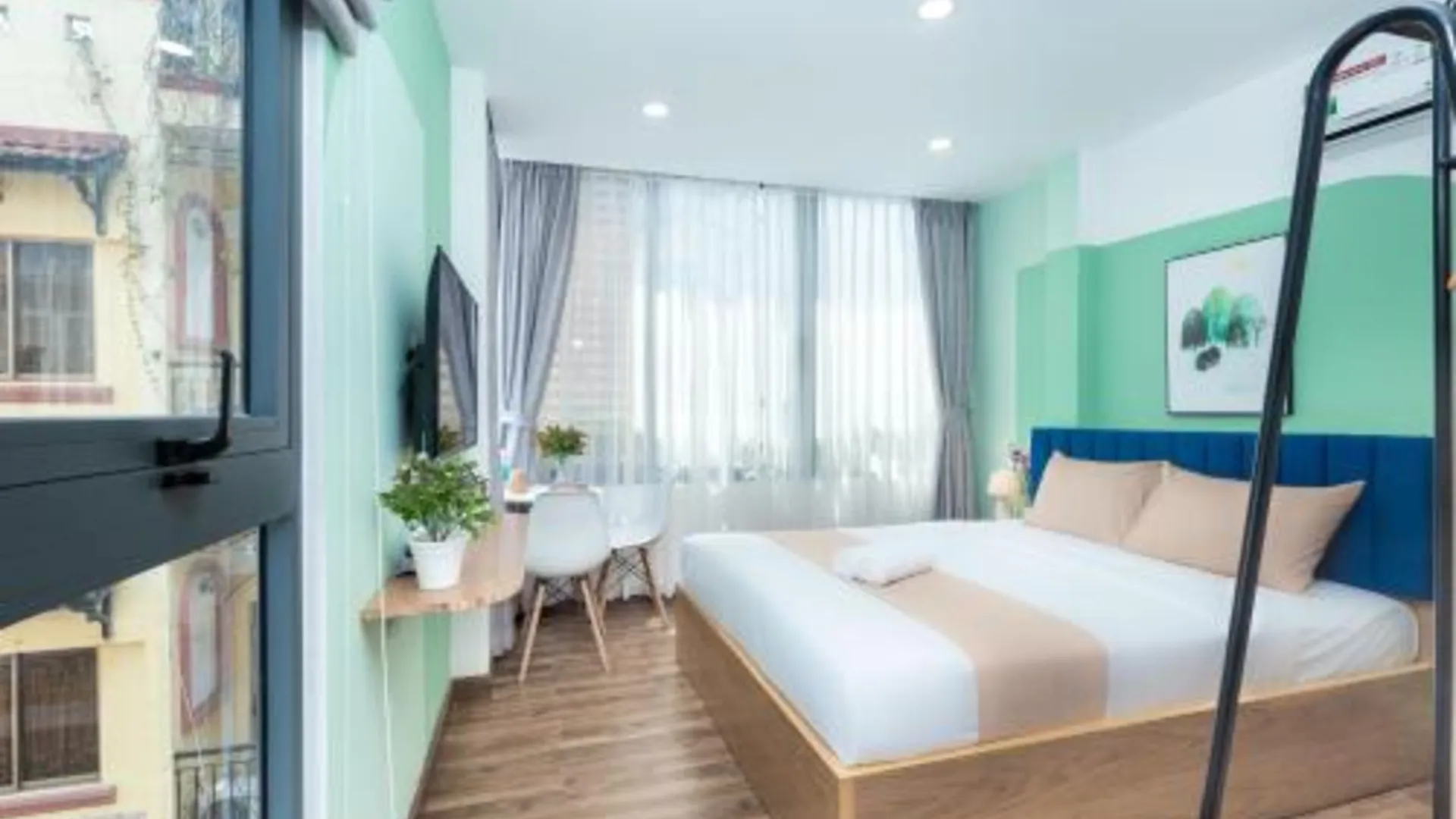 호치민 코즈룸 홈즈 차밍 코너 2 3성급 게스트하우스 스위트룸