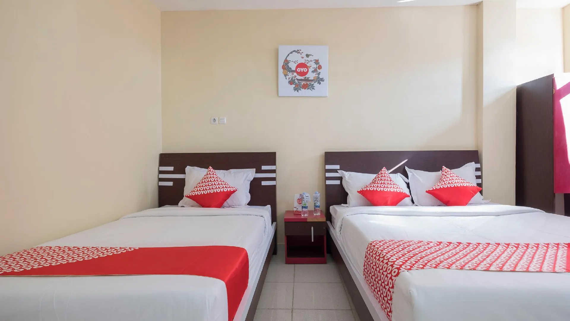 마카사르 오요 1075 루마 인다 로사리 인 2성급 호텔 스위트룸