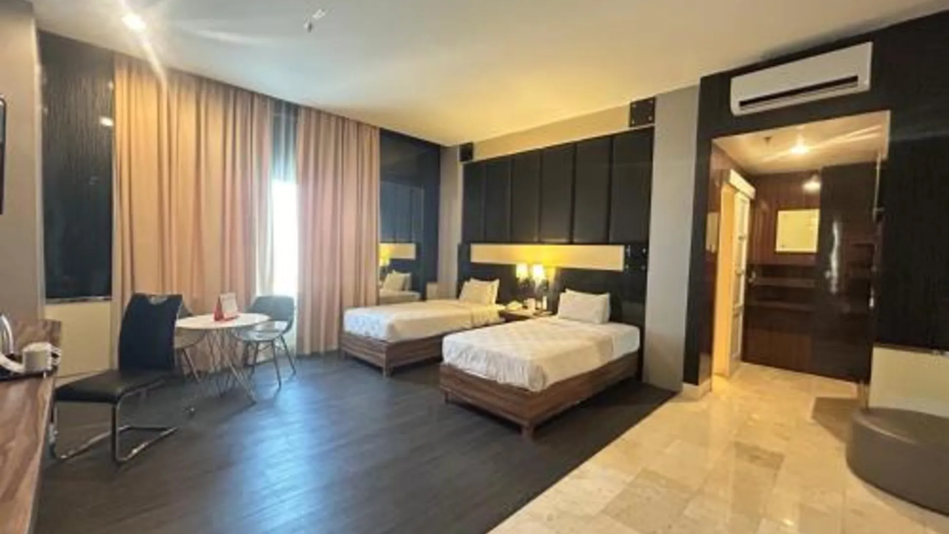 마카사르 스위스-벨코트 마카사르 3성급 호텔 스위트룸