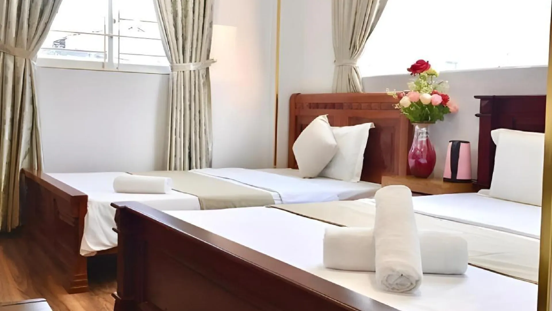 호치민 써니 게스트하우스 1성급 호텔 스위트룸