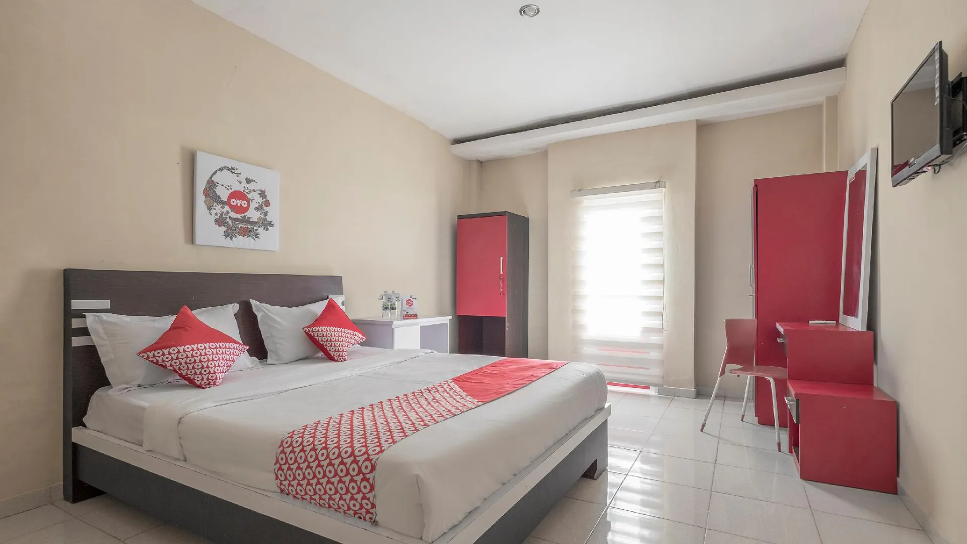 마카사르 오요 1075 루마 인다 로사리 인 2성급 호텔 객실