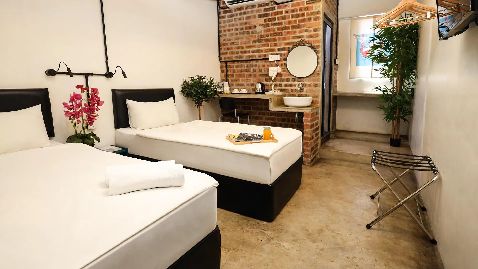 쿠알라테렝가누 스위트 18 부티크 호텔 2성급 호텔 스위트룸