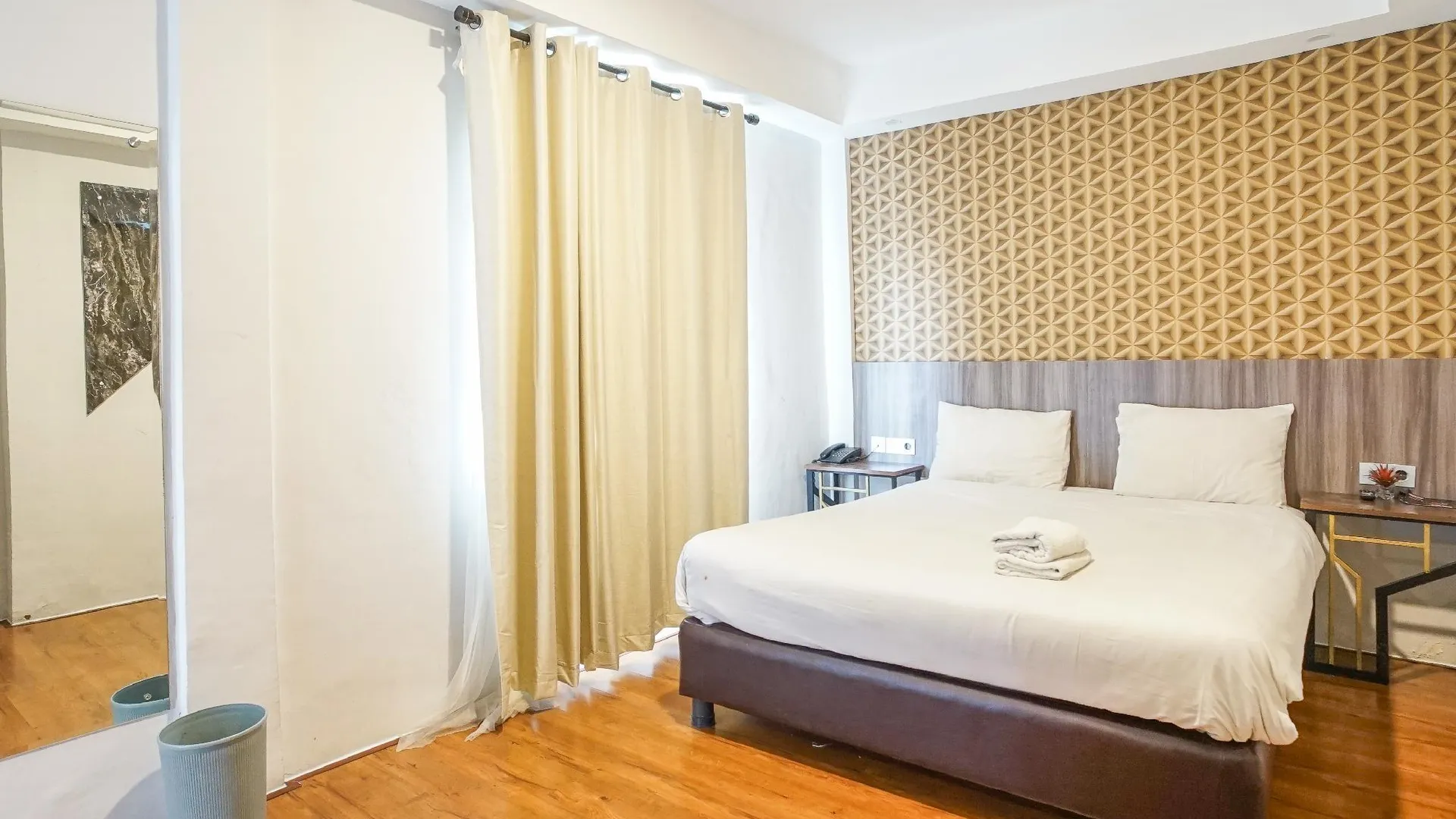 마카사르 호텔 산리나 마카사르 호텔 스위트룸