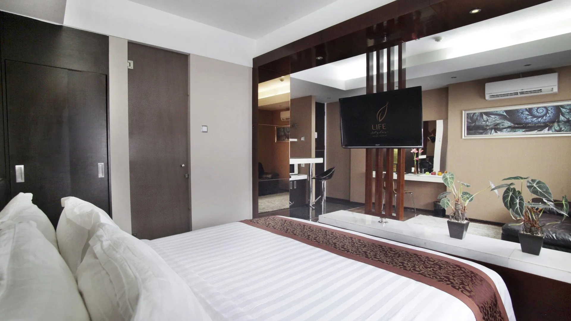 마카사르 페이버 호텔 마카사르 시티 센터 바이 LIFE 3성급 호텔 스위트룸